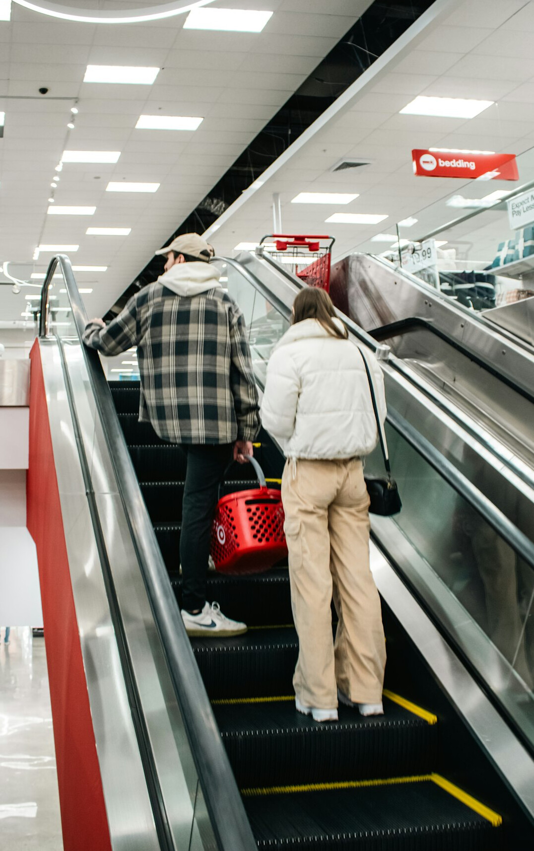 security guard chasing shoplifter in department store