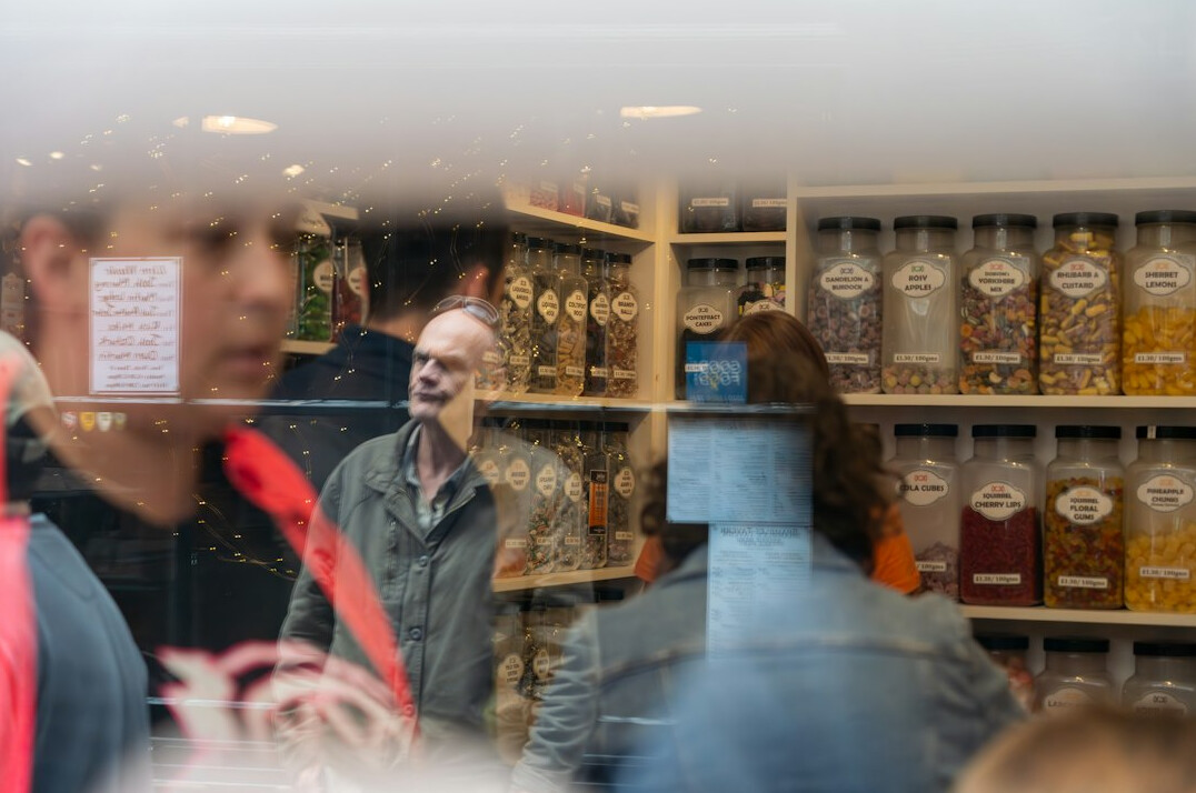 store security guard watching customers
