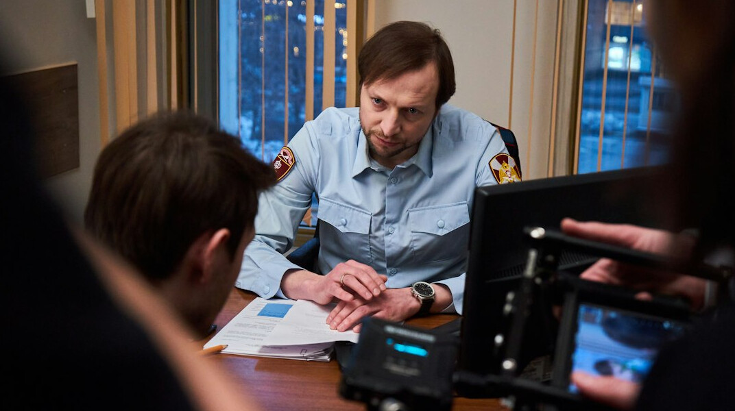 detective interviewing suspect